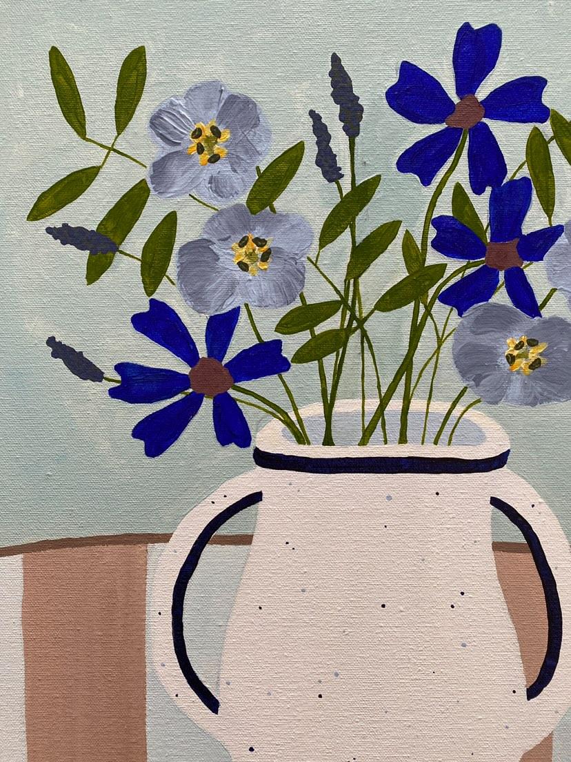 Blue Flowers On A Striped Table